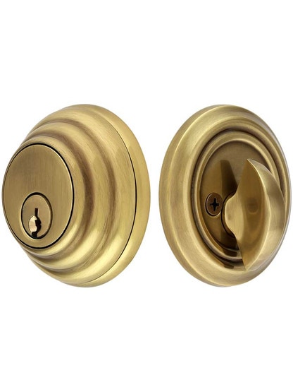 Solid Brass Single Cylinder Low-Profile Deadbolt in Antique Brass.